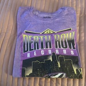 This is a woman’s large death row shirt